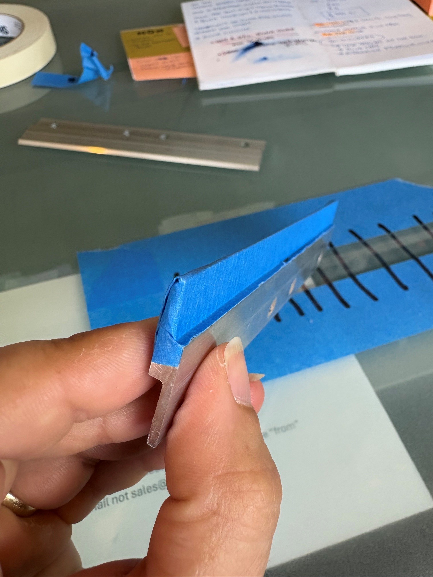 Tape applied to the cleat, ready to be trimmed with an X-Acto knife